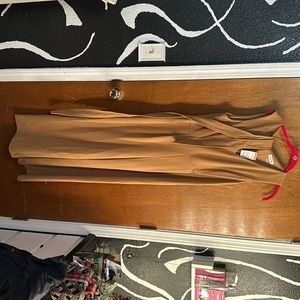 Beige Calvin Klein jumpsuit with tags